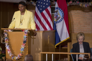  June 23, 2015 Pastor Traci Blackmon prays as Democratic presidential candidate Hillary Rodham Clinton listens at Christ the King United Church of Christ in Florissant, Mo, near Ferguson. Whitney Curtis/Getty Images 